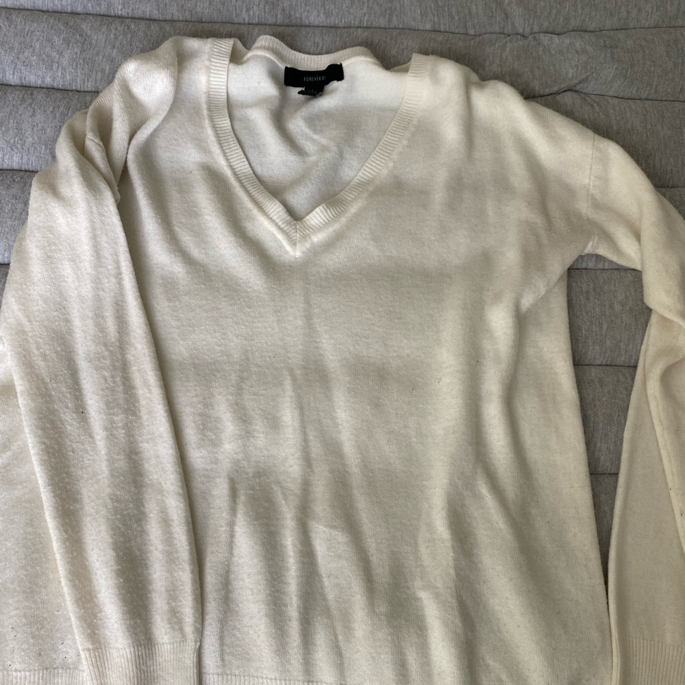 Soft knit white sweater, not too heavy and perfect for cool weather